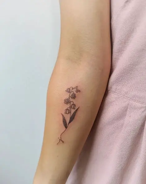 Birthflower and Initial Forearm Tattoo