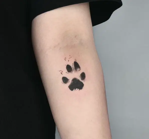 Black Ink Dog Paw Print Forearm Tattoo