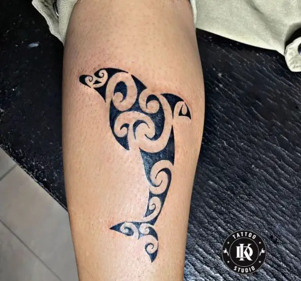 Black Inked Tribal Dolphin Tattoo
