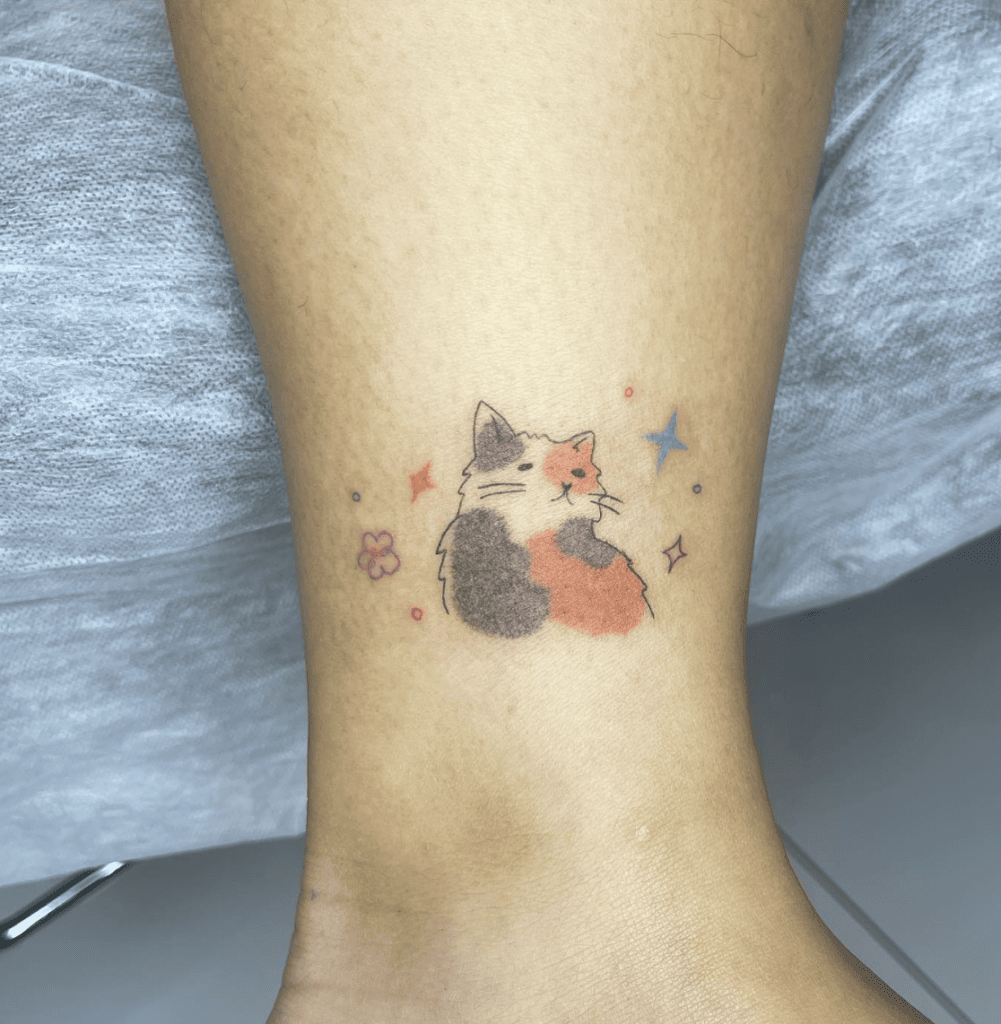 Black and Orange Calico Cat Ankle Tattoo