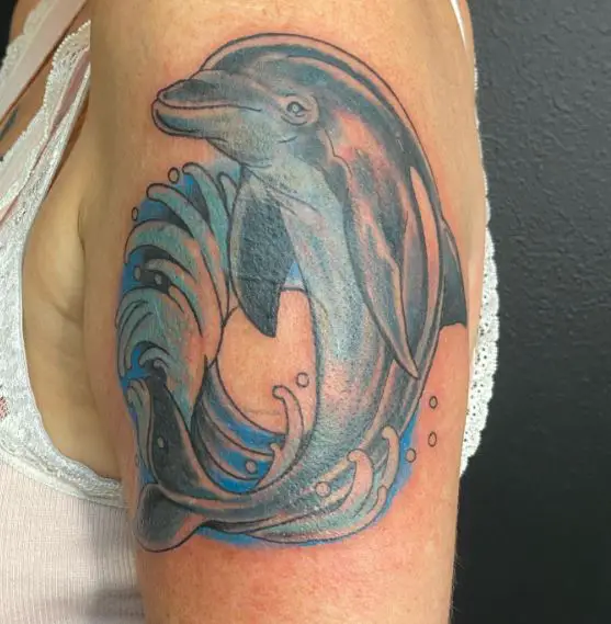 Blue Dolphin with Water Splash Arm Tattoo
