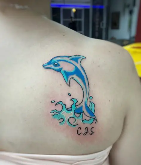 Blue with Black Line Dolphin Tattoo Piece