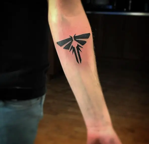 Bold Ink Moth Forearm Tattoo