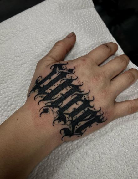 Bold Ink Sinner Ambigram Hand Tattoo