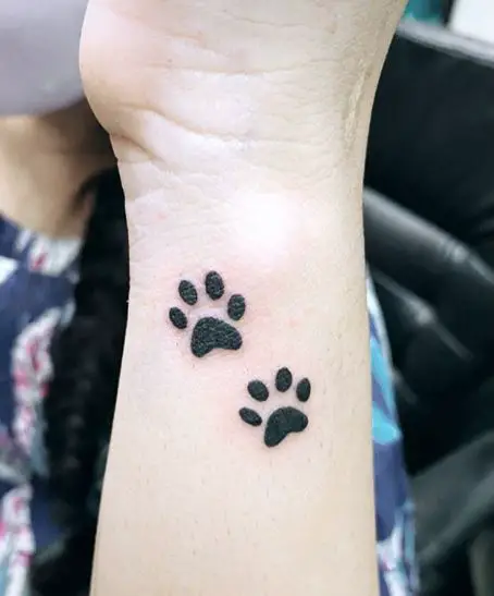 Bold Ink Twin Dog Paw Tattoo
