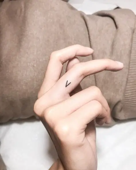 Bold Line Letter V Finger Tattoo