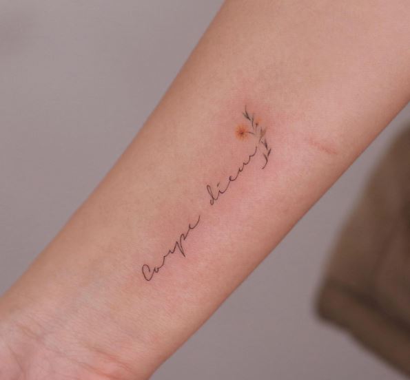 Carpe Diem Text with a Tiny Flower Tattoo