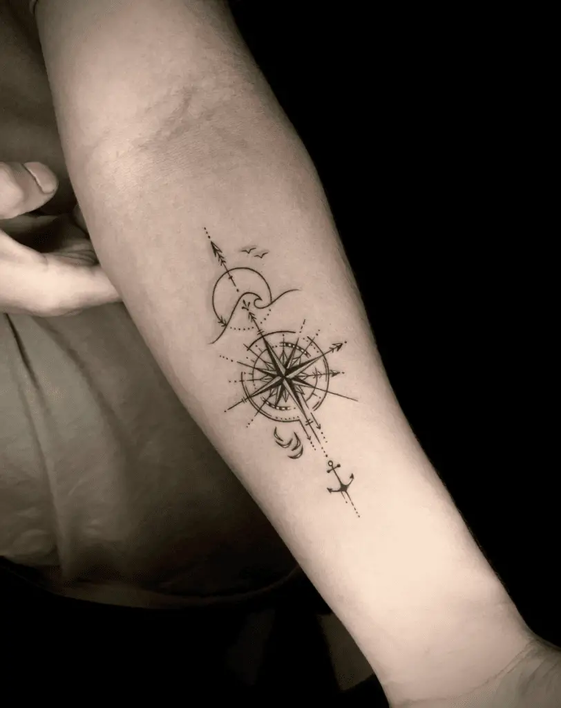 Compass and Sea Life Arm Tattoo