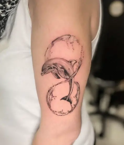 Dolphin with Water Arm Tattoo