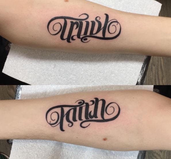 Faith, Trust Ambigram Forearm Tattoo