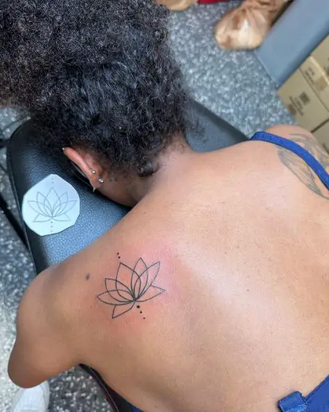 Fine Line Lotus Back Tattoo