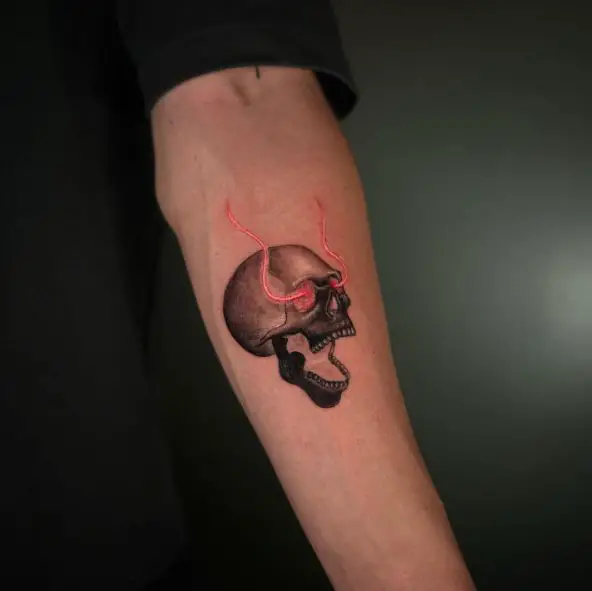 Flaming Skull Forearm Tattoo