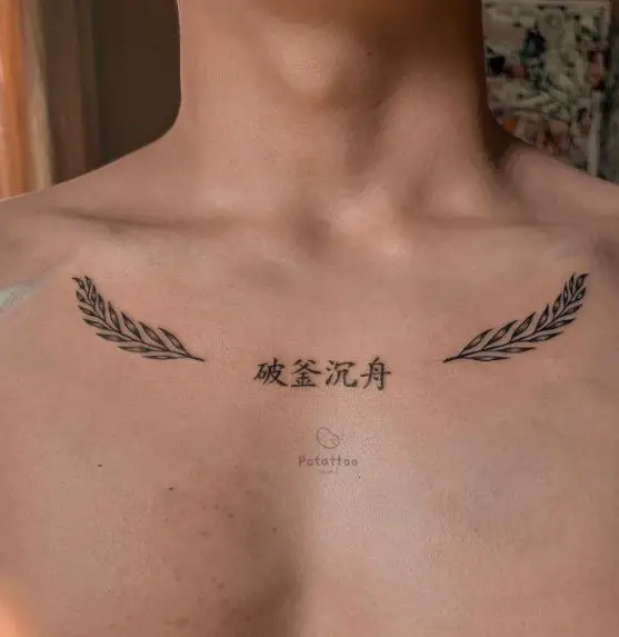 Foreign Language with Leaves Collarbone Tattoo