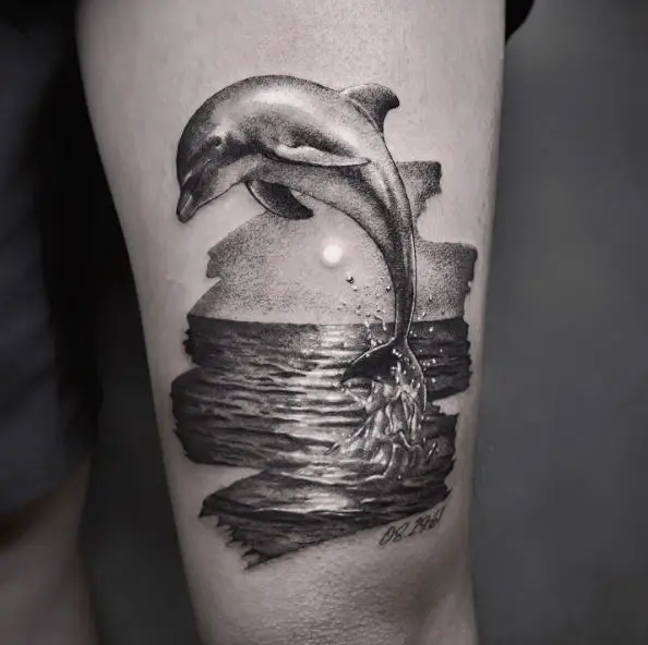 Greyscale Ocean and Dolphin Thigh Tattoo