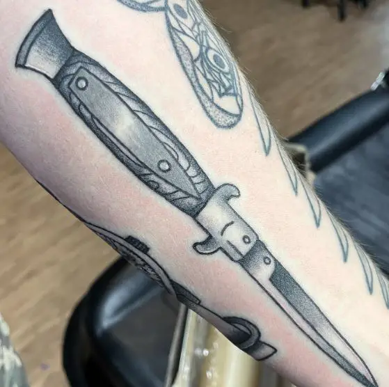 Greyscale Switchblade Tattoo