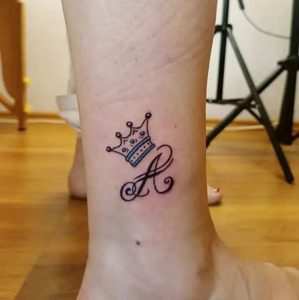 Letter A with a Tiny Crown Ankle Tattoo