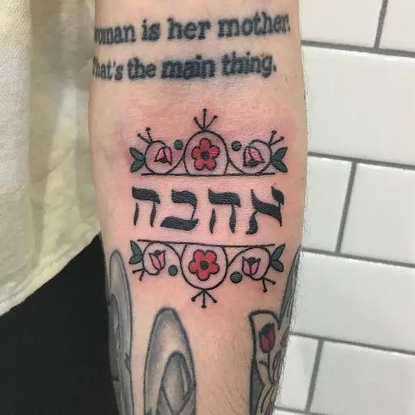 Love in Hebrew Text with Flowers Forearm Tattoo