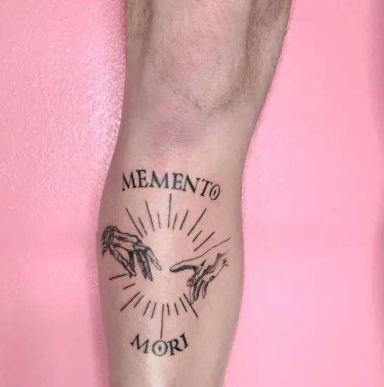 Memento Mori Lettering and Skeletal Hand and Human Hand Tattoo