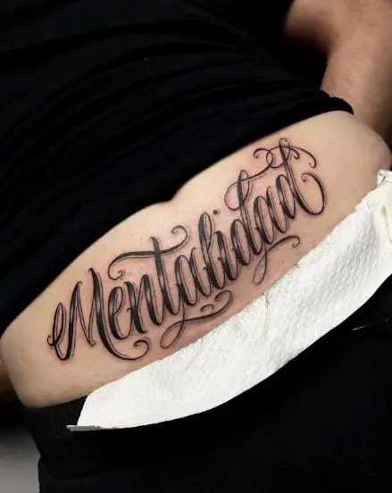 Mentalidad Other Language Belly Tattoo