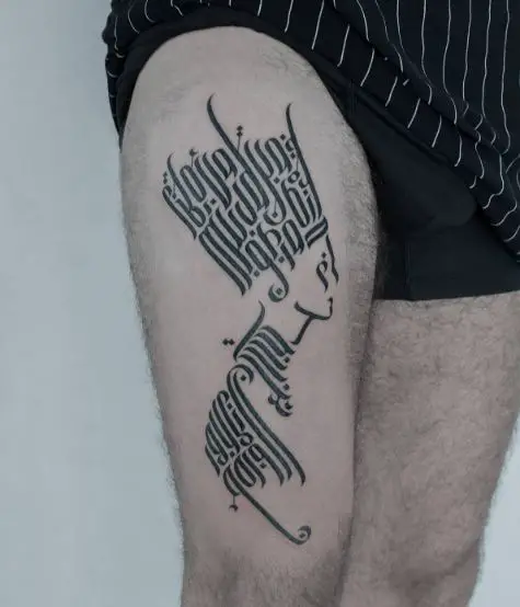 Nefertiti Hebrew Calligraphic Thigh Tattoo