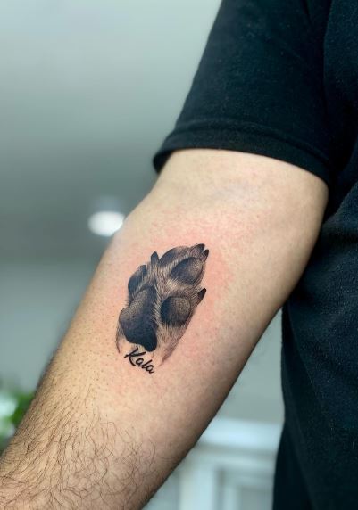 Realistic Dog Paw Print Forearm Tattoo