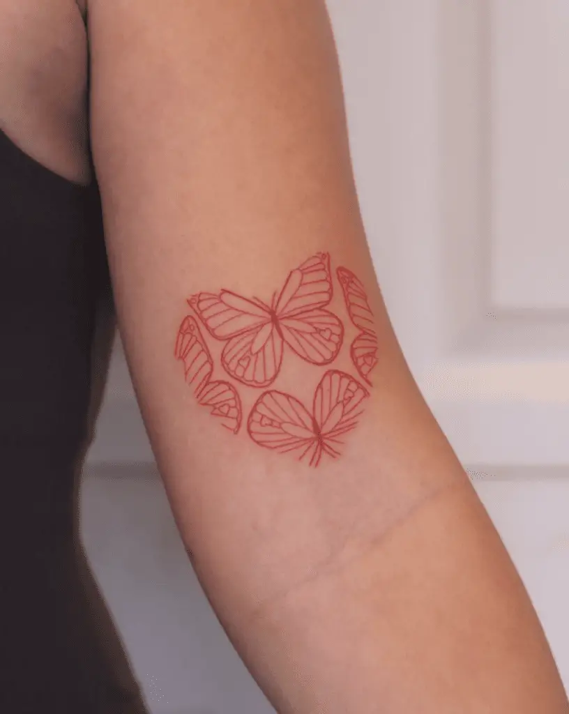 Red Ink Butterfly Heart Tattoo