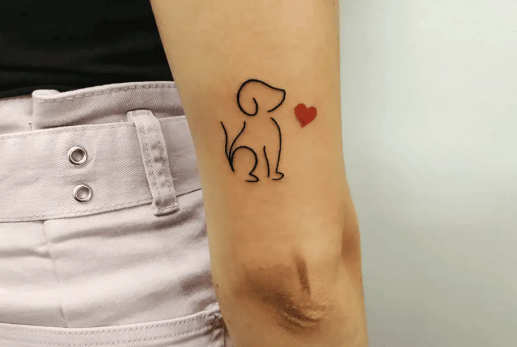 Side View Outline Dog Beside the Red Heart Arm Tattoo