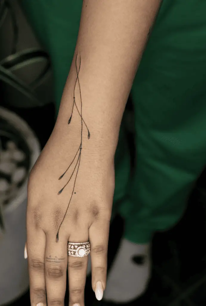 Simple Flower Lines Hand Tattoo