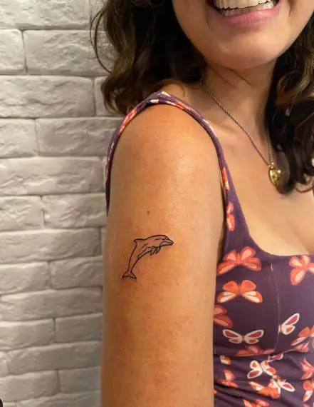 Small Dolphin Arm Tattoo