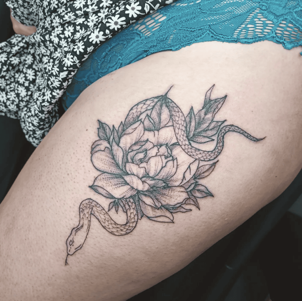 Snake and Lotus Flower Thigh Tattoo