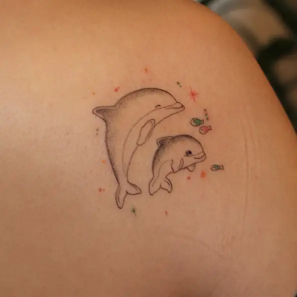 Two Baby Dolphins Tattoo with Sparks