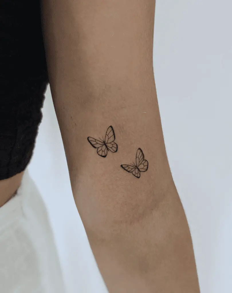 Two Tiny Butterflies Line Tattoo
