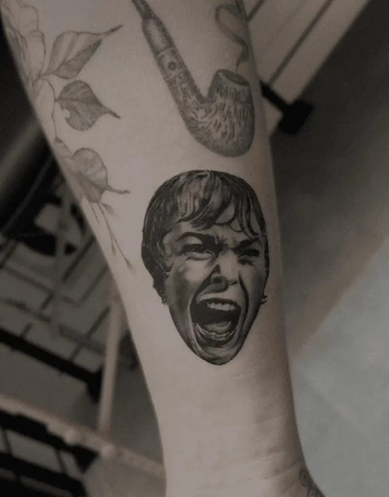 A Girl Head Screaming Leg Tattoo