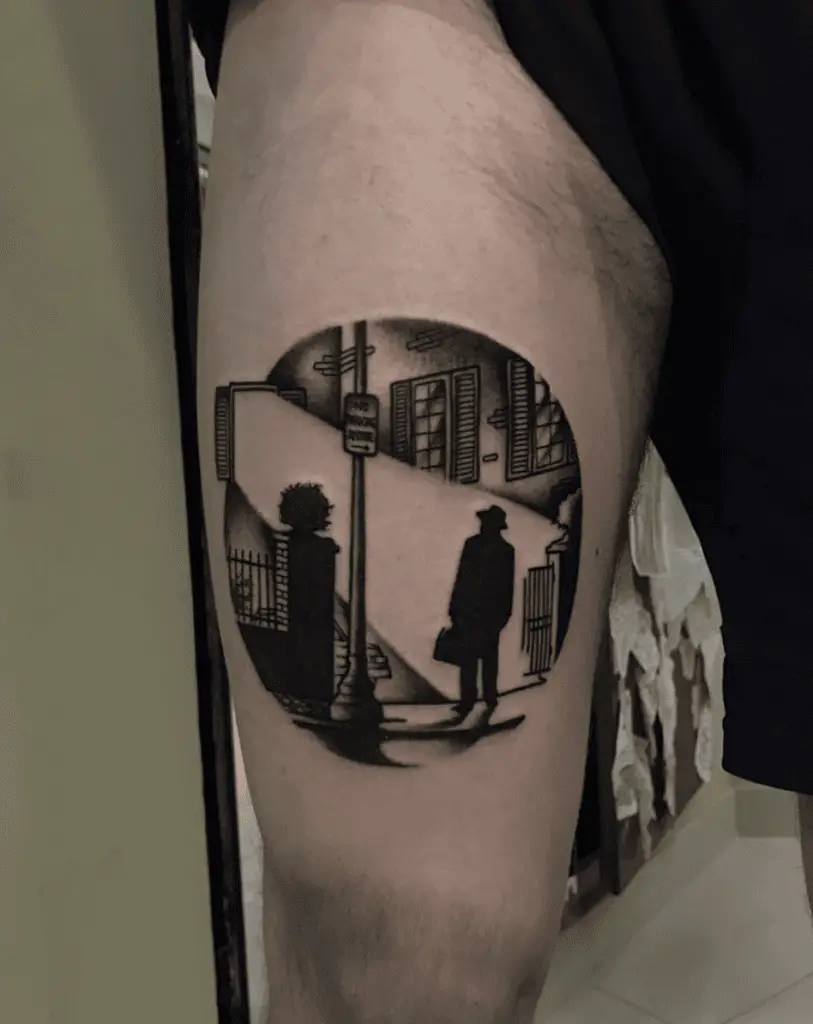 A Man Standing in Front of the House in Circle Shape Leg Tattoo