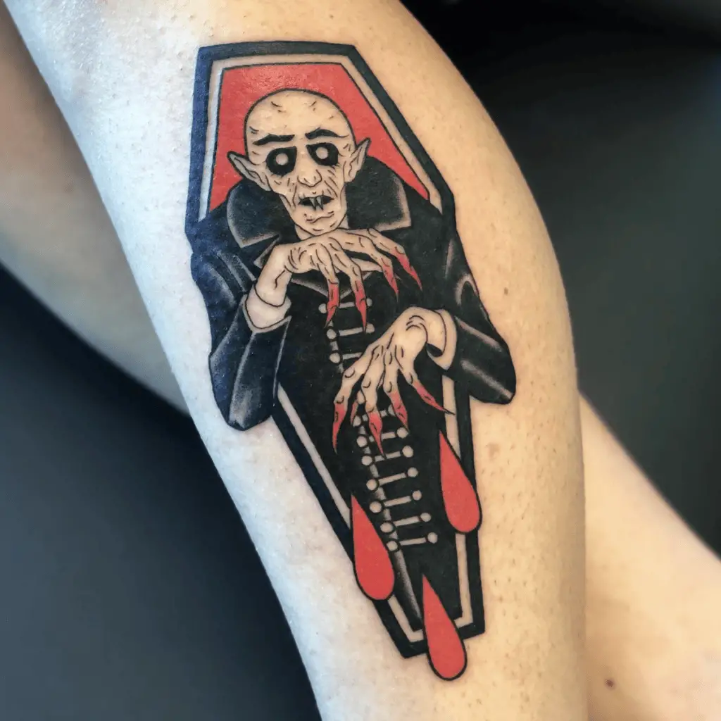 Bald Vampire Inside the Coffin With Long Nails Blood Dripping Leg Tattoo