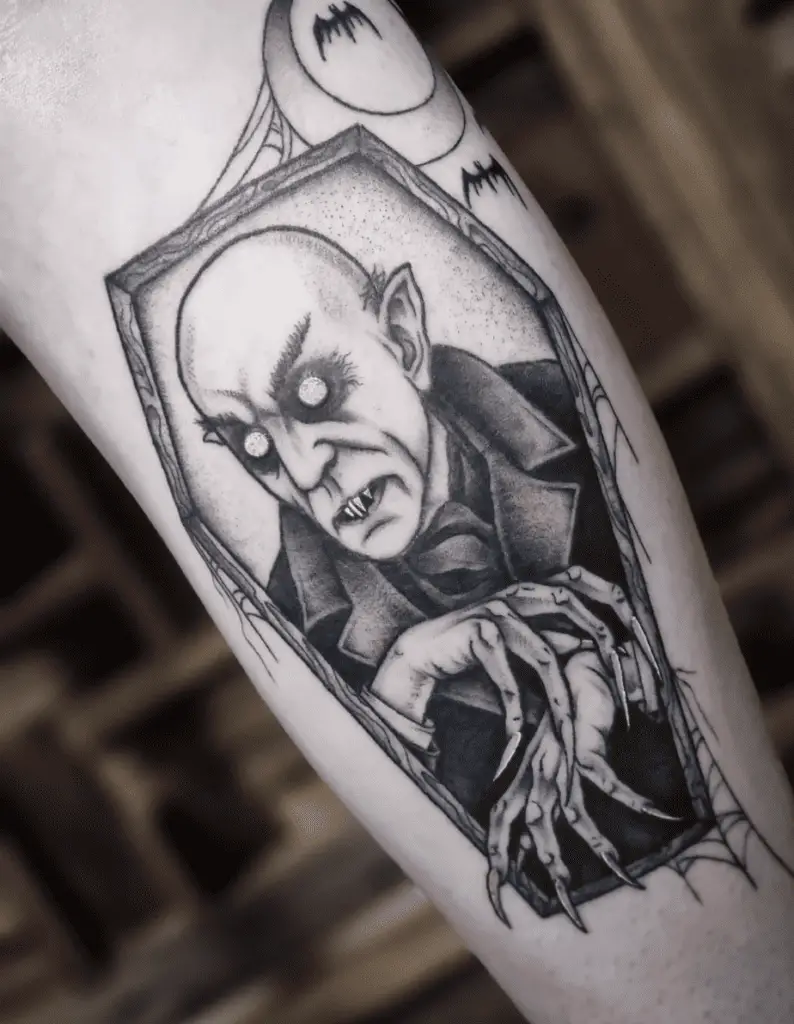 Bald Vampire in Spider Web Wooden Coffin Arm Tattoo