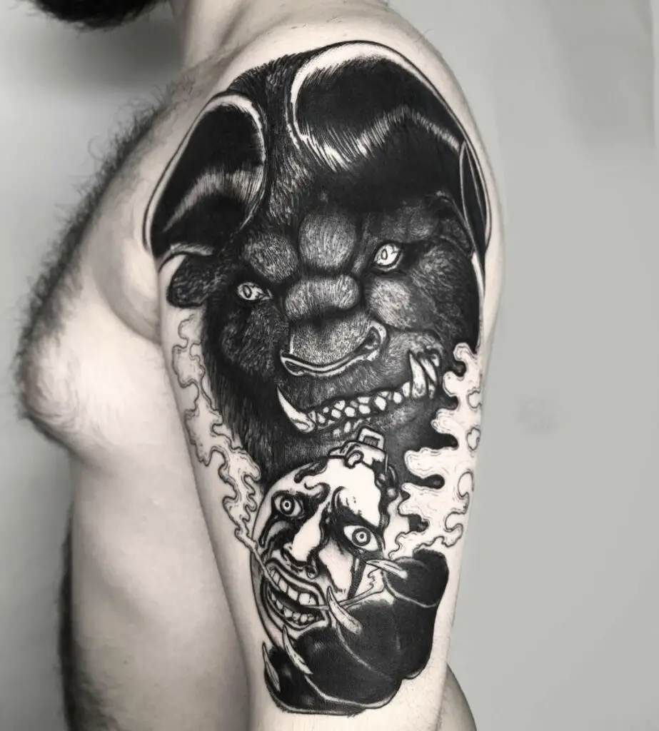 Black Works Angry Nosferatu Zodd Holding Behelit Upper Arm Tattoo