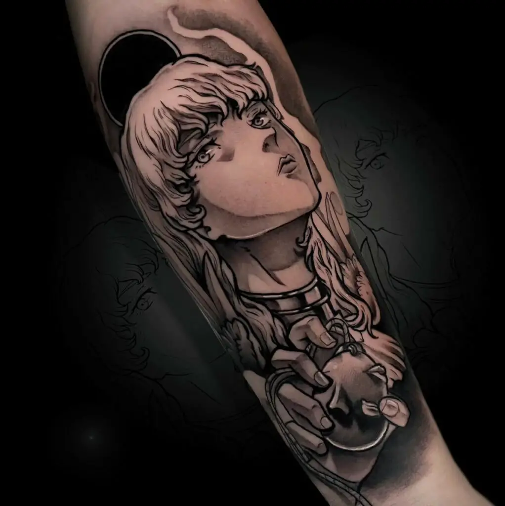 Black and Grey Look Up Griffith While Holding Behelit Arm Tattoo