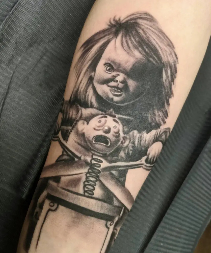 Chucky Cutting Jack In The Box Arm Tattoo