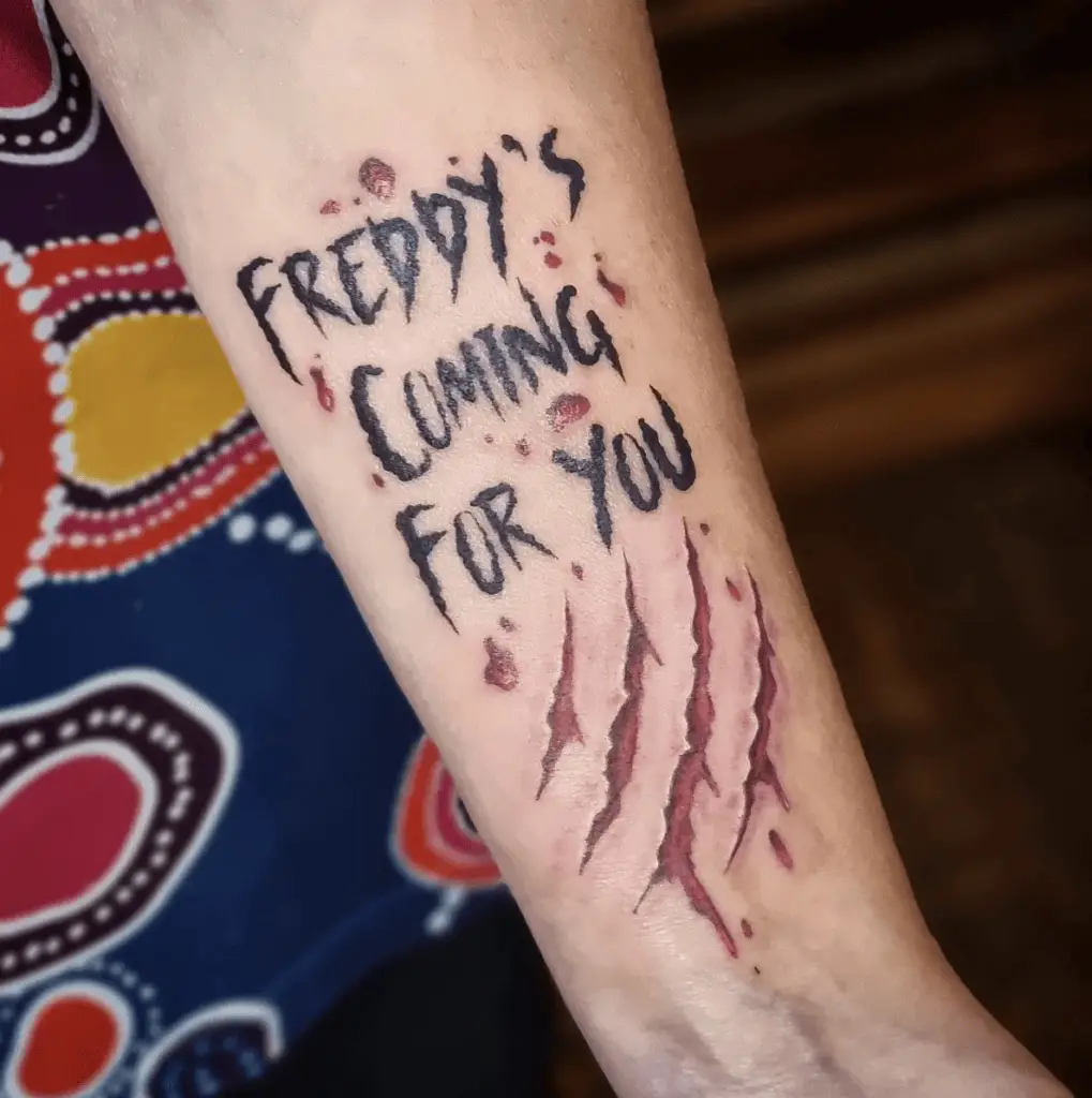 Claw Scratch Marks and Word Phrase Text Arm Tattoo