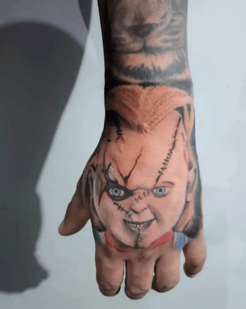Colored Chucky Hand Tattoo