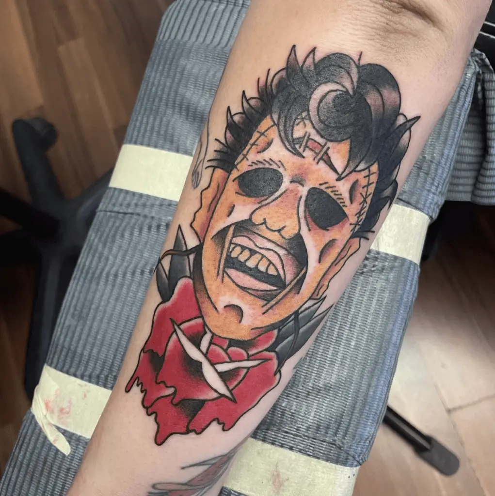 Colored Creepy Man with Rose Arm Tattoo
