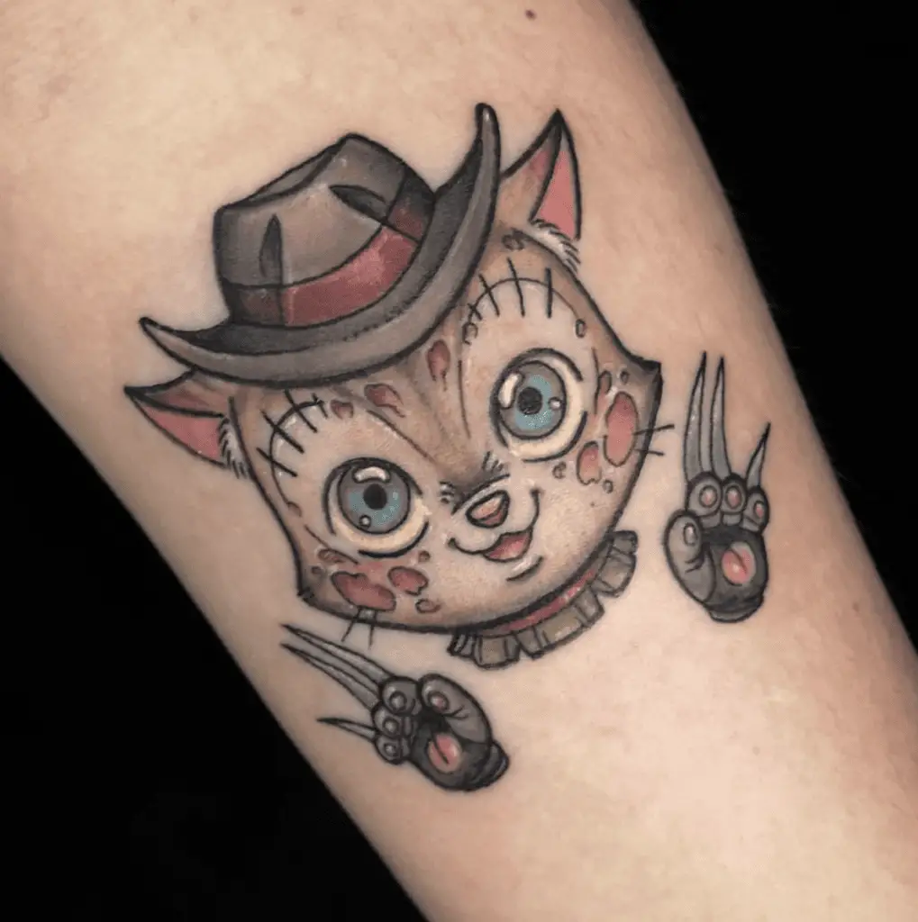 Colored Kitten Wearing a Fedora Hat and Sharp Claws Arm Tattoo