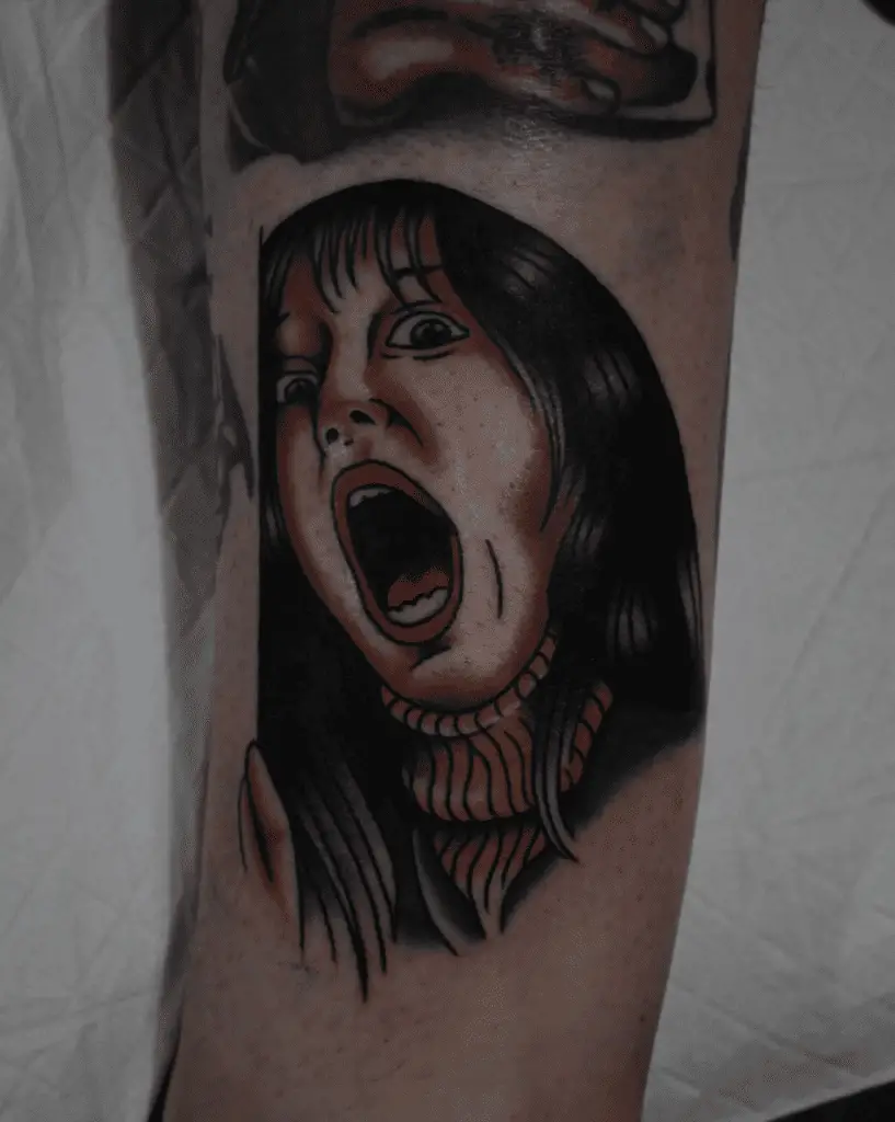 Colored Woman With Turtle Neck Clothes Screaming Leg Tattoo