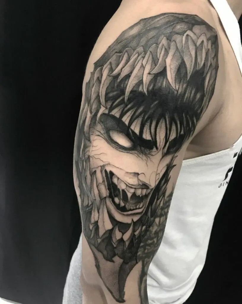 Crazy Guts Inside the Creature With Sharp Fangs Upper Arm Tattoo