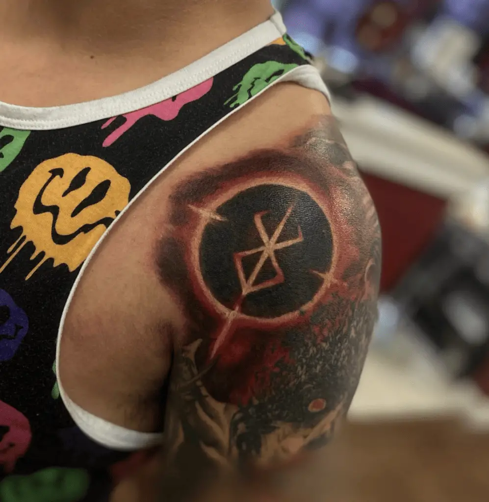 Eclipse With Red Black Shadows and Berserk Mark Arm Sleeve Tattoo