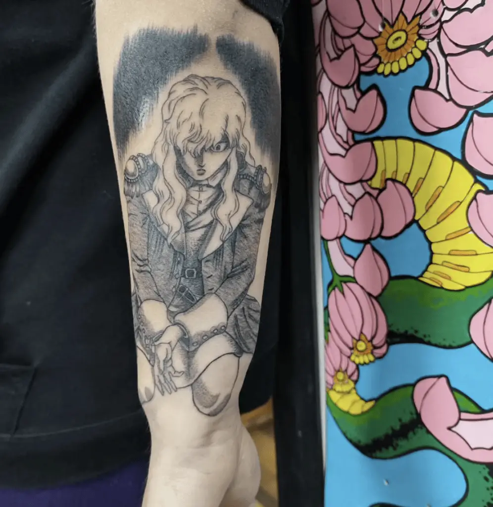 Griffith Kneeling Down in Unpleasant Surprised Arm Tattoo