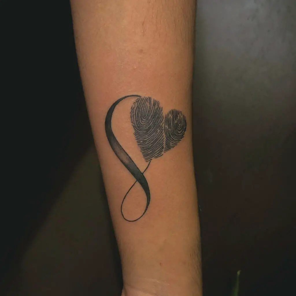 Heart Thumbprint and Infinity Sign Arm Tattoo