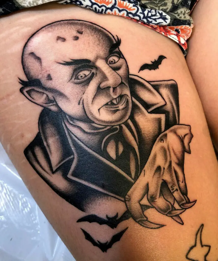 Illustration of Bald Vampire With Bats Thigh Tattoo