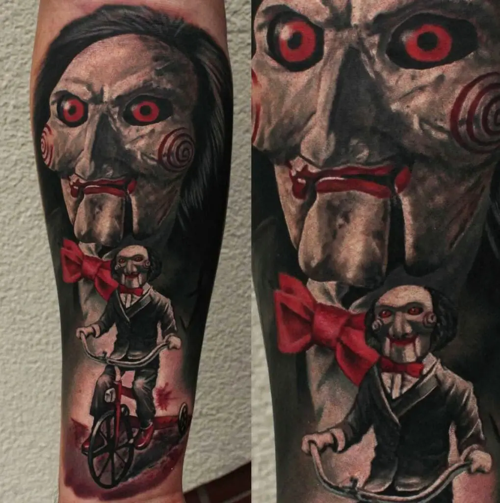Jigsaw Riding Bicycle And His Wide Face Behind Him Background Arm Tattoo
